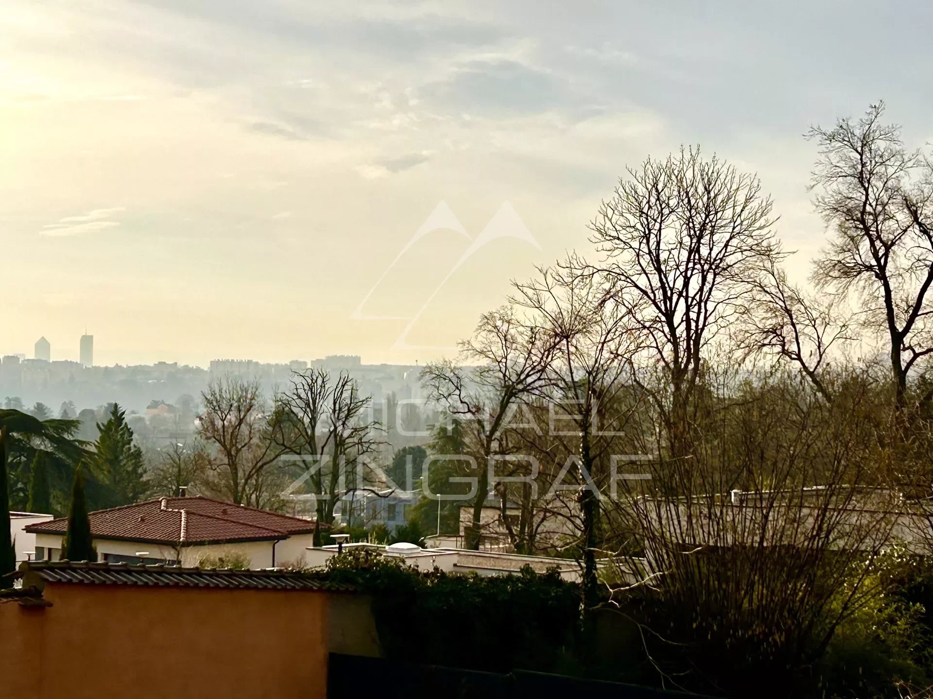 Village house in the heart of St Cyr with its garden, pool, and beautiful view of Lyon.