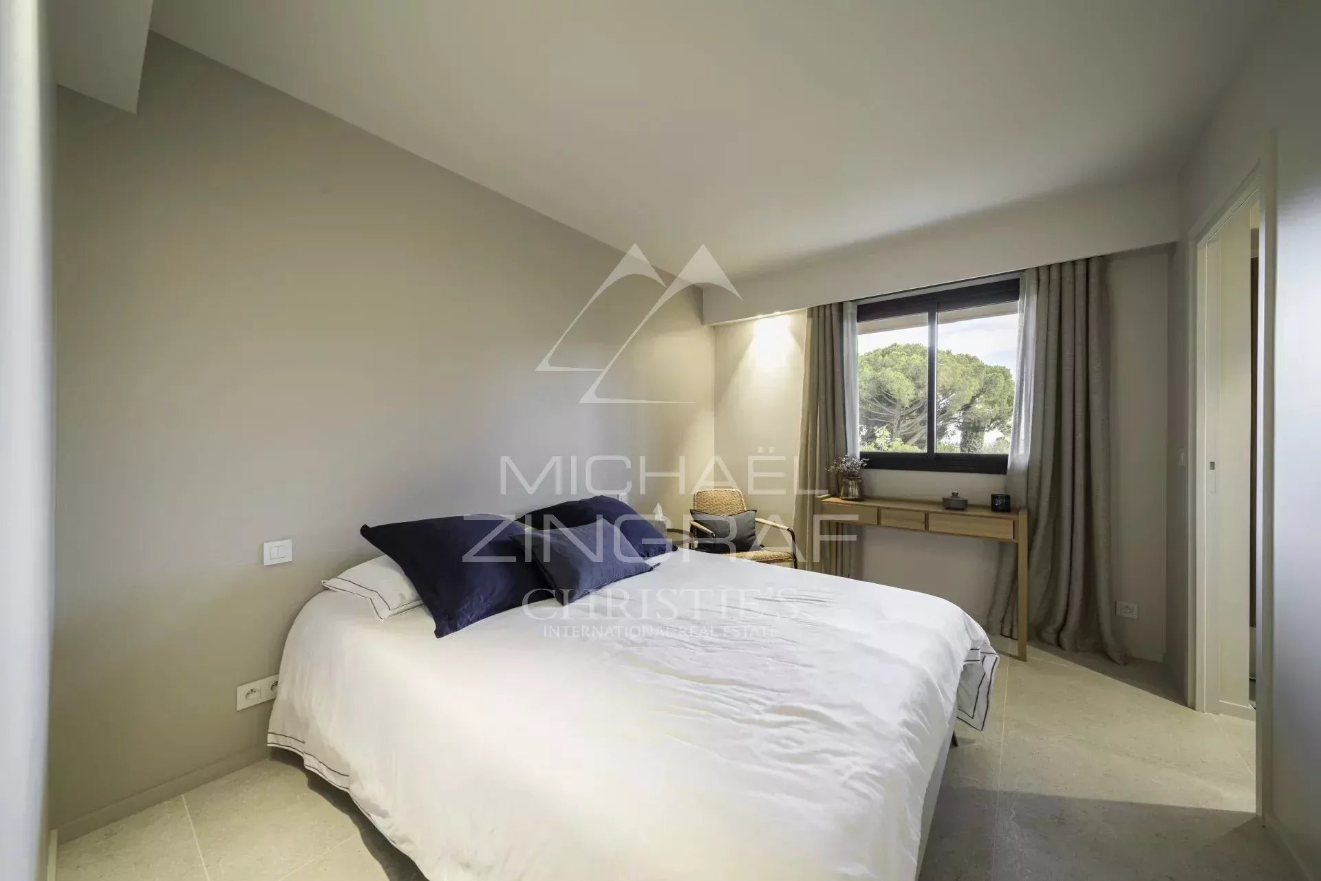 Stunning Two-Bedroom Apartment with Sunny Terrace and Pool