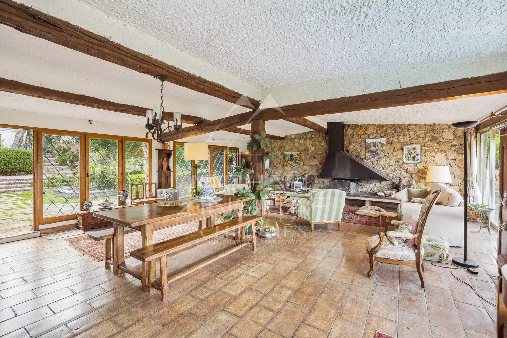 Exceptional estate with private woodland, landscaped grounds, tennis court, and open views