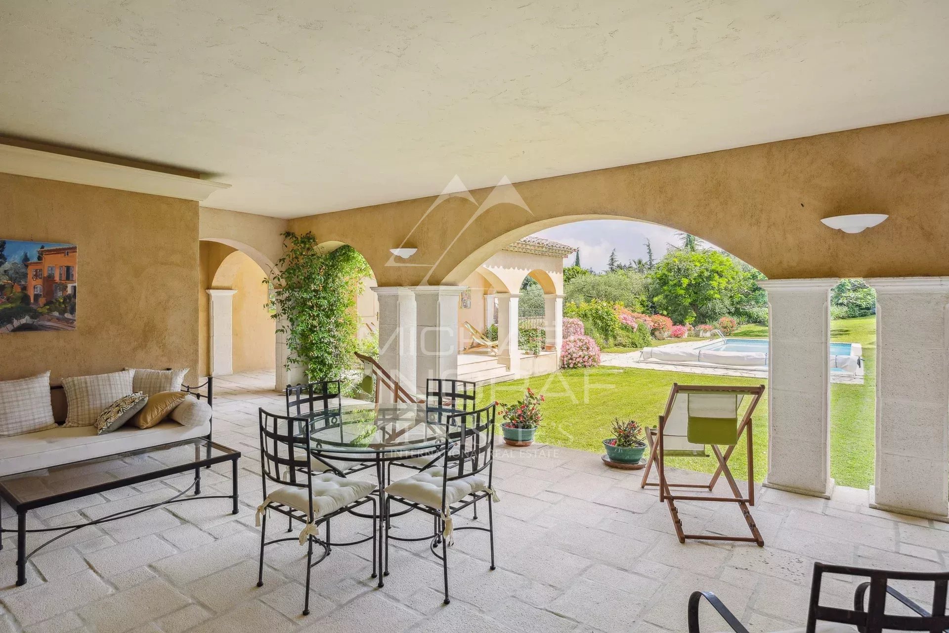 Exceptional estate with private woodland, landscaped grounds, tennis court, and open views