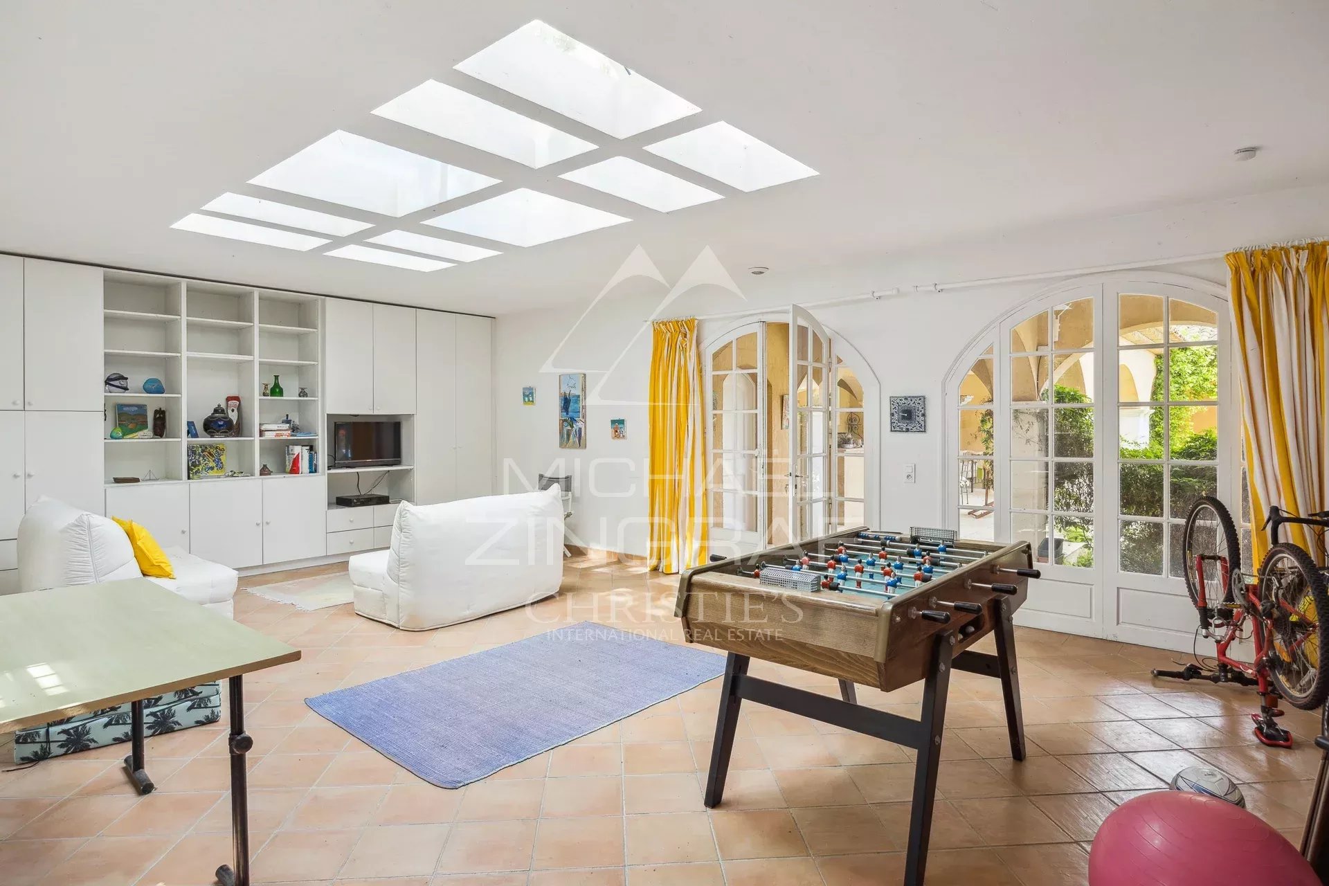 Exceptional estate with private woodland, landscaped grounds, tennis court, and open views