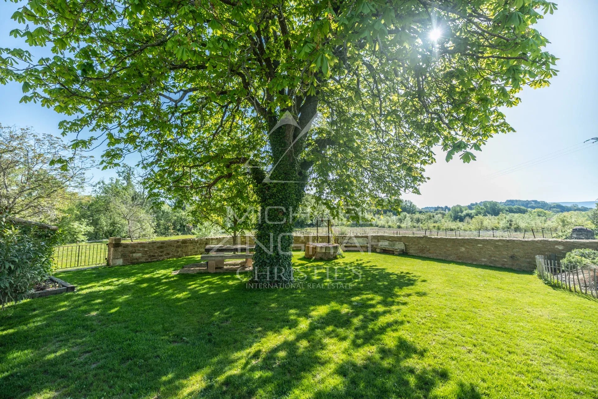 A stunning, fully renovated farmhouse on 2.6 hectares of land with a swimming pool.